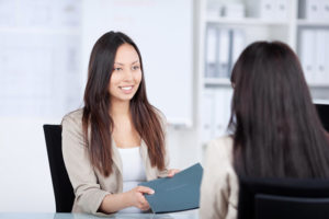 Woman making a counter offer at a negotiation